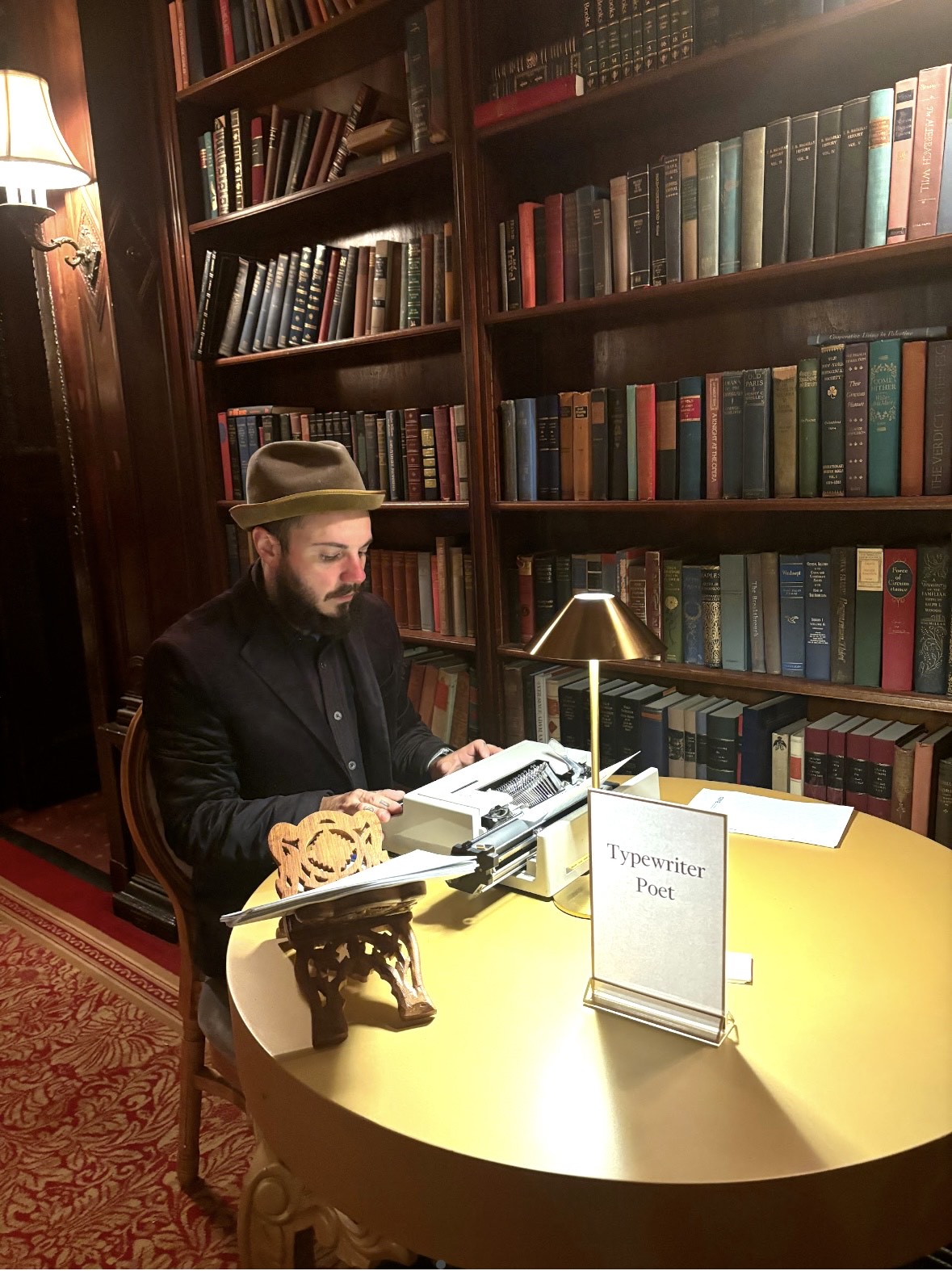 Typewriter poet in library